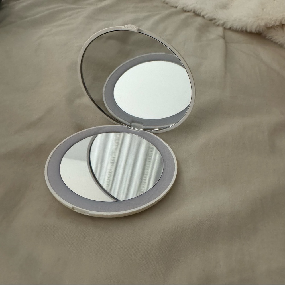 Impressions Vanity Illuminated Compact Mirror.